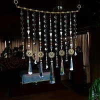 Adorn your personal space with our unique, exceptional chandelier beaded curtain or what we lovingly refer to as a "Window Necklace". The fluid nature (similar to a necklace) of this eleven strand hanging, allows for gentle movement after being hung which creates wonderful and beautiful reflections with just about any light and atmosphere.New Asfour chandelier crystal prisms (Epic Rainbows!). Beads and gemstones include: Aventurine, Green Quartz, Green Kyanite. Vintage and new Czech glass.